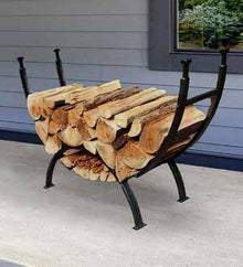 UniFlame W-1859 contemporary log rack filled with firewood beside a porch