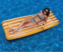 Swimline 90605 CoolStripe Lounger - orange color in use, manufacturer catalog