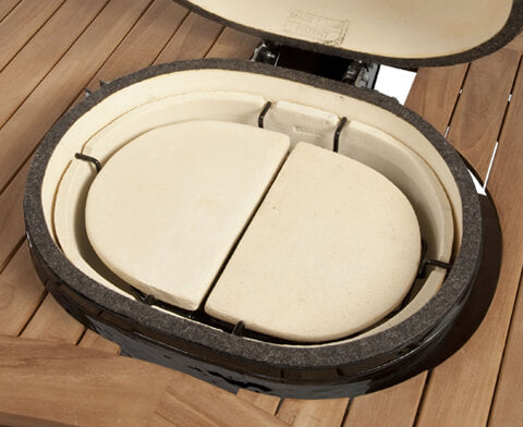 Primo ceramic heat deflector plates installed for indirect cooking; grill and support racks sold separately