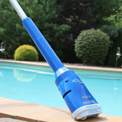 Pool Blaster Aqua Broom poolside with an optional telescoping pole
