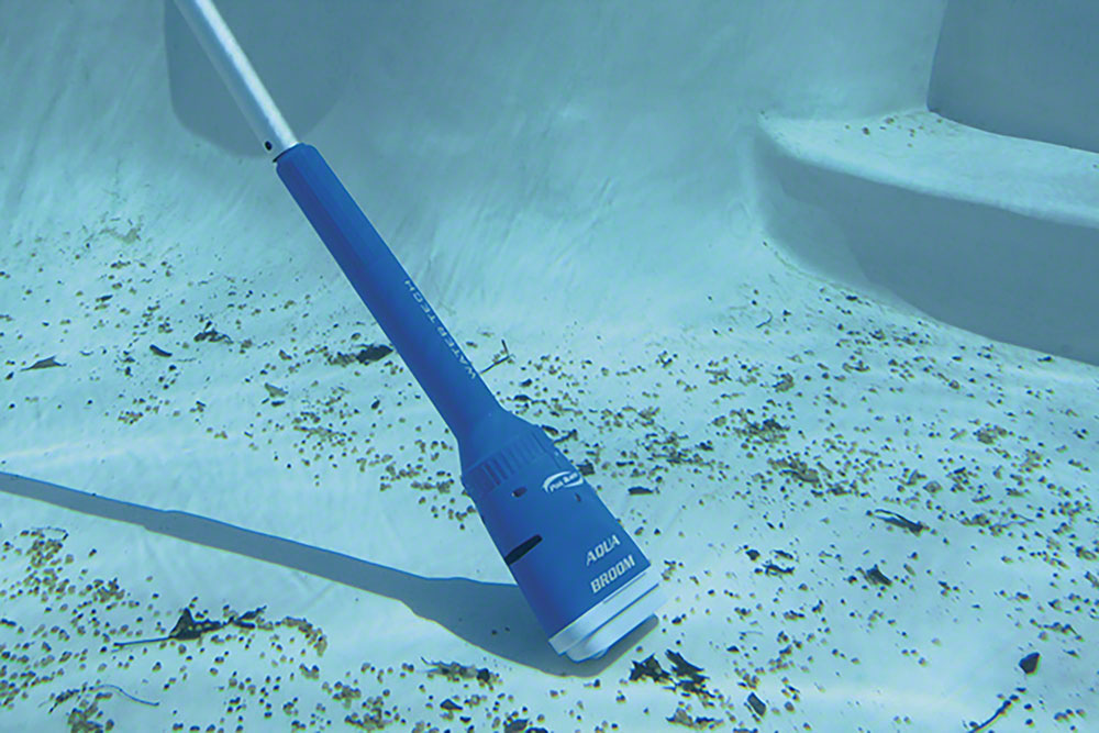 Pool Blaster Aqua Broom cleaning debris underwater with an optional pole