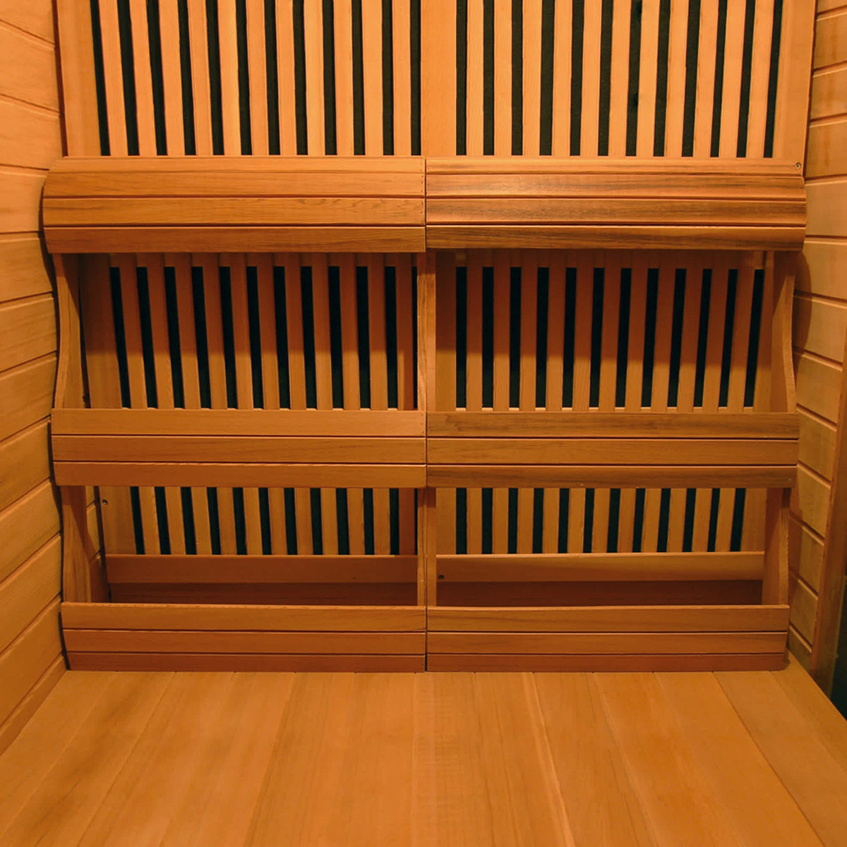 HeatWave Hudson Bay three-person corner cedar sauna carbon heater and protective wood grille close-up